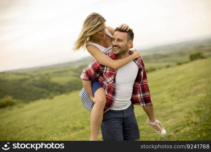 Young loving coulpe having fun in the spring nature