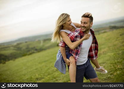 Young loving coulpe having fun in the spring nature