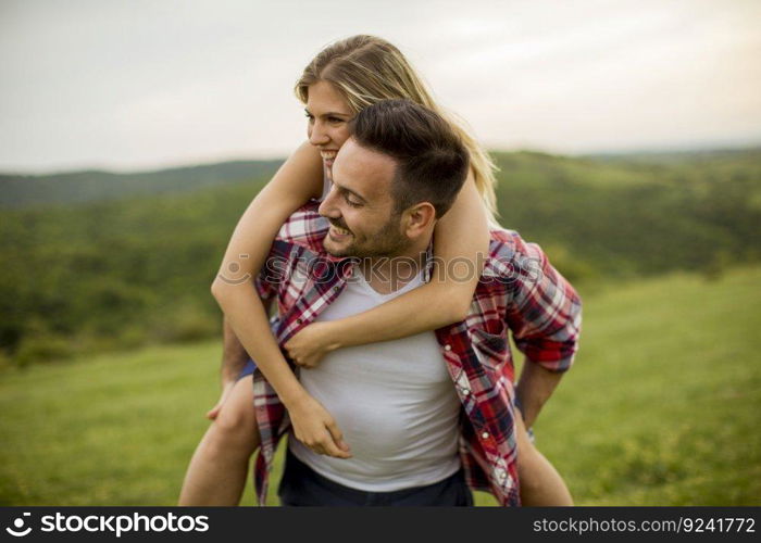 Young loving coulpe having fun in the spring nature