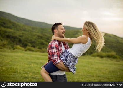 Young loving coulpe having fun in the spring nature