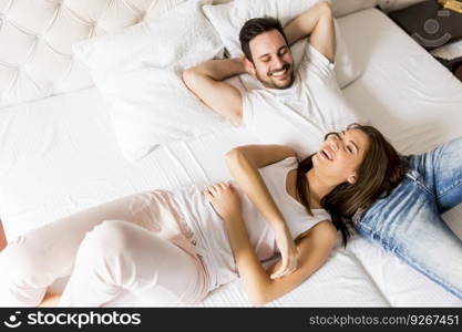 Young loving couple in bed