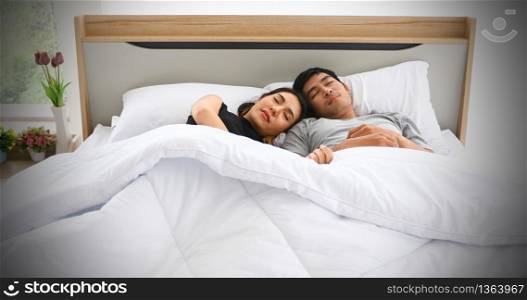 Young loving couple in the bed and Romantic couple in love on bedtime and happiness concept