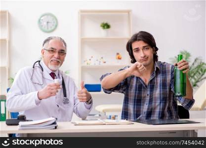 Young male alcoholic visiting old doctor  