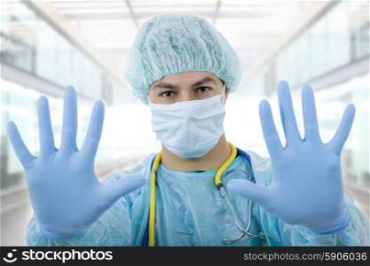 young male doctor going stop with his hands