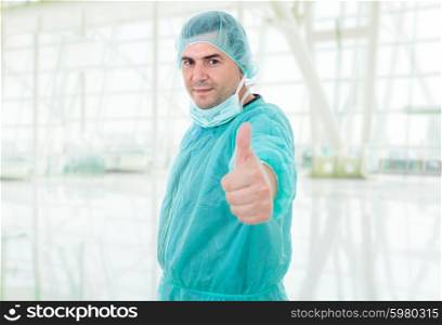 young male doctor going thumb up
