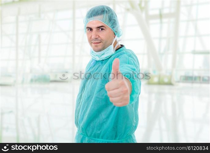 young male doctor going thumb up