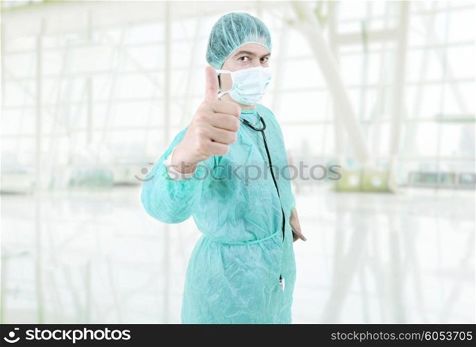 young male doctor going thumb up at the hospital