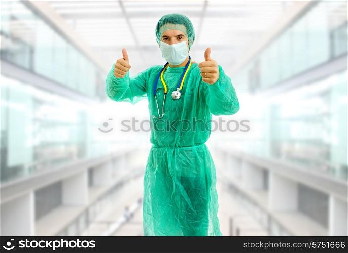 young male doctor going thumbs up at the hospital