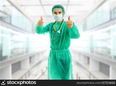 young male doctor going thumbs up at the hospital