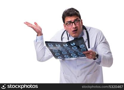 Young male doctor holding a radiograph isolated on white backgro. Young male doctor holding a radiograph isolated on white background