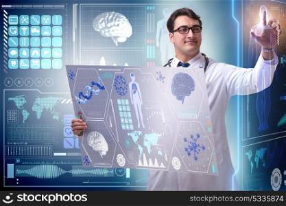 Young male doctor in futuristic medical concept
