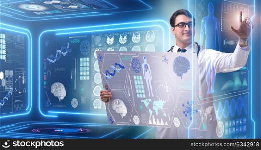 Young male doctor in futuristic medical concept