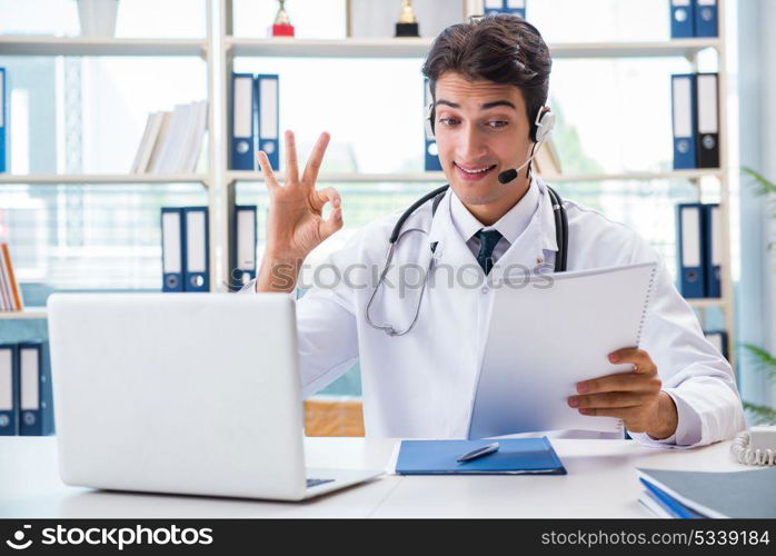 Young male doctor in telehealth concept