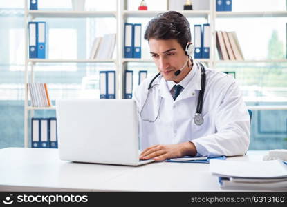 Young male doctor in telehealth concept