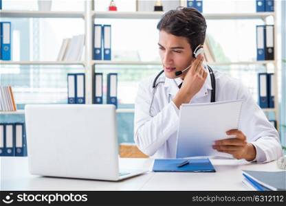 Young male doctor in telehealth concept. The young male doctor in telehealth concept