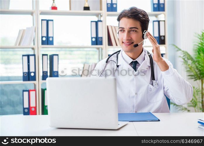 Young male doctor in telehealth concept. The young male doctor in telehealth concept