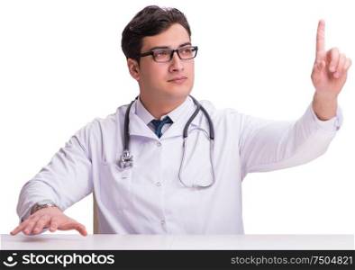 Young male doctor isolated on white background. The young male doctor isolated on white background
