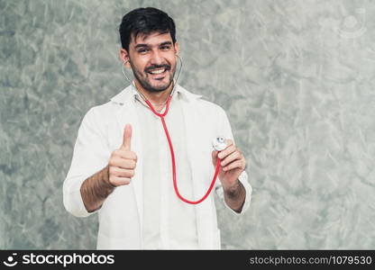 Young male doctor working at the hospital. Medical healthcare and doctor staff service.