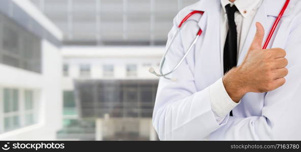 Young male doctor working at the hospital. Medical healthcare and doctor staff service.