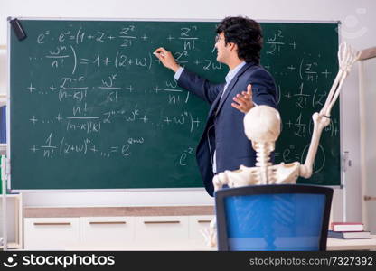 Young male math teacher and student skeleton