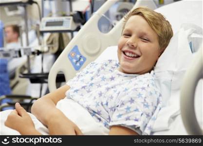 Young Male Patient In Hospital Bed