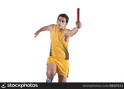 Young male relay runner isolated over white background
