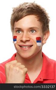 Young Male Sports Fan With Serbian Flag Painted On Face