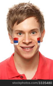 Young Male Sports Fan With Serbian Flag Painted On Face