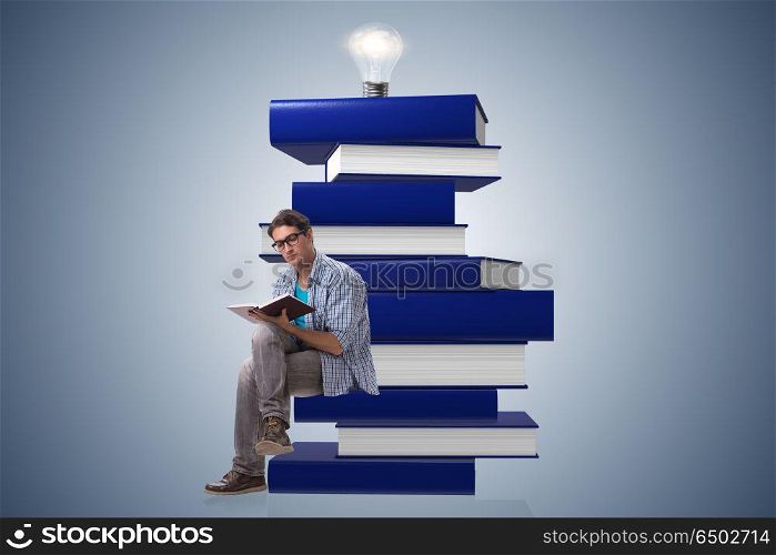 Young male student in education concept. Young male student in education concept. Young male student in education concept