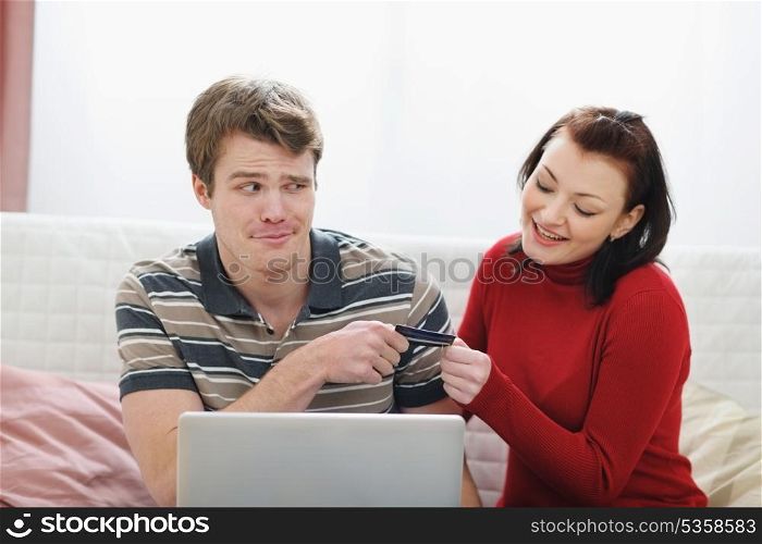 Young man afraid to give credit card to girlfriend