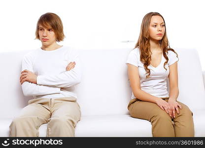 Young man and woman angry and conflicting