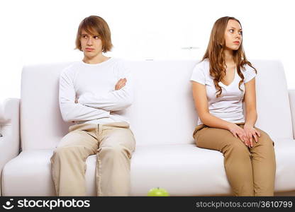 Young man and woman angry and conflicting