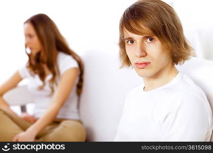 Young man and woman angry and conflicting