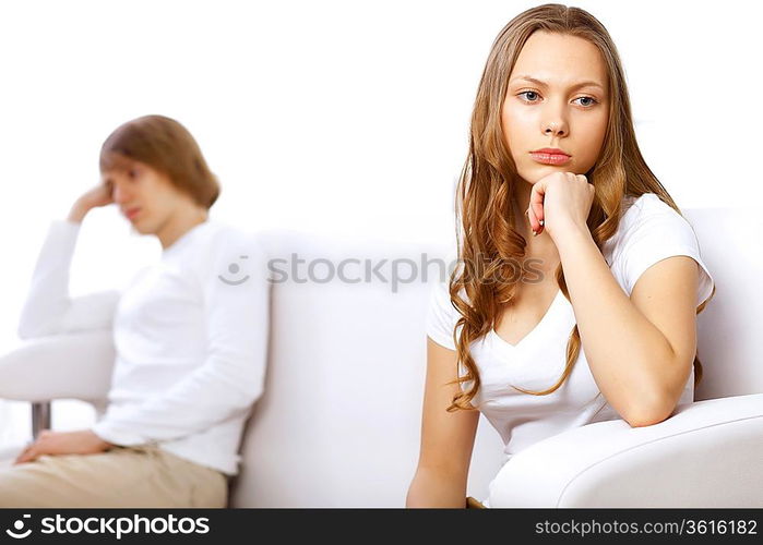 Young man and woman angry and conflicting