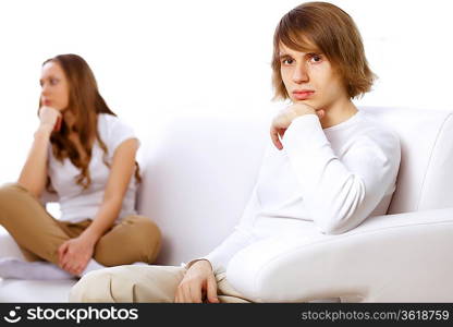 Young man and woman angry and conflicting