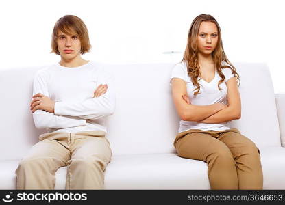 Young man and woman angry and conflicting