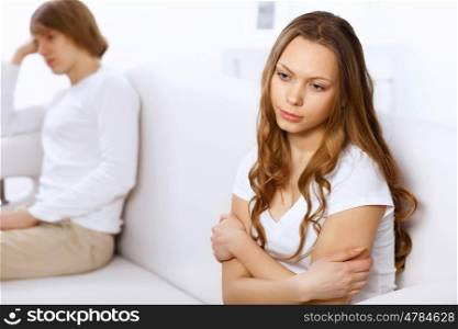 Young man and woman angry and conflicting
