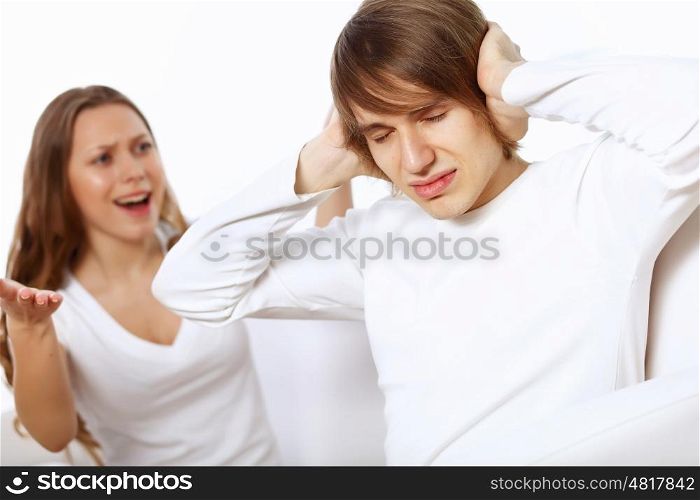 Young man and woman angry and conflicting