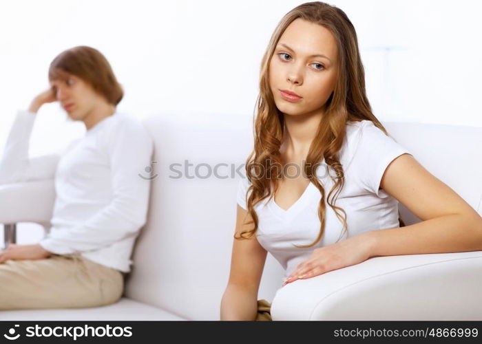 Young man and woman angry and conflicting