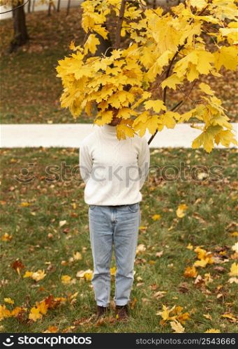 young man autumn leaves