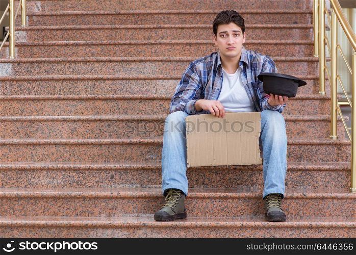 Young man begging money on the street