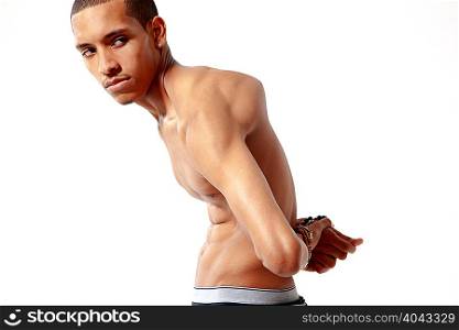 Young man bent in awkward position