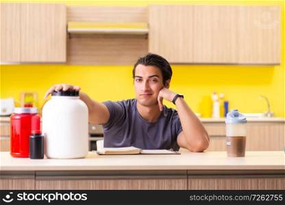 Young man blogging about food additives. The young man blogging about food additives