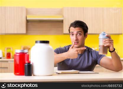 Young man blogging about food additives. Young man blogging about food supplements