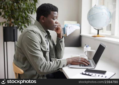 Young Man Business Entrepreneur Working From Home On Laptop