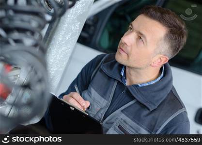 young man car mechanician