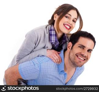 Young man carrying his girlfriend at the back on a white isolated background