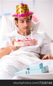 Young man celebrating his birthday in hospital