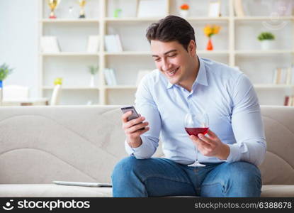 Young man chatting with his sweetheart over mobile phone