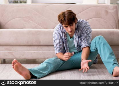 Young man committing suicide with razor blade